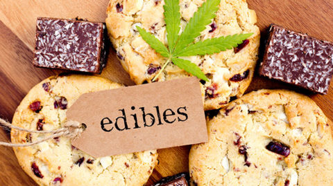 Cookies and brownies with marijuana leaf on top