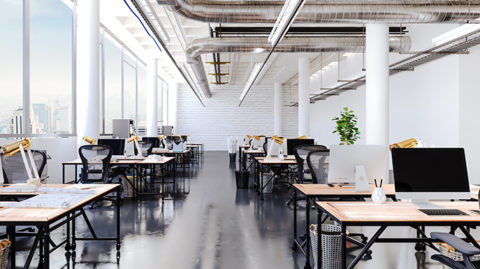 Rows of desks at high end city office